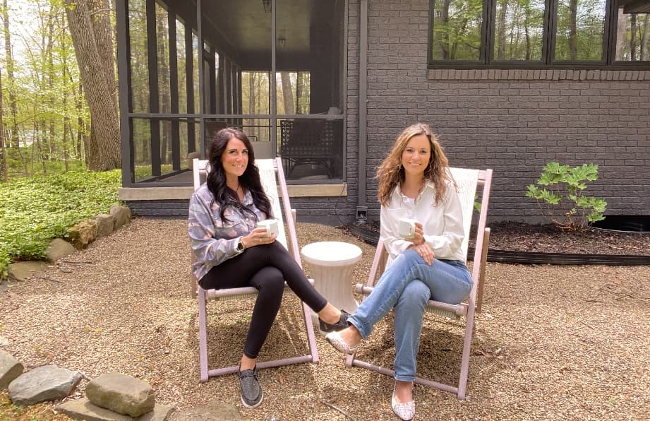 Darci Wise and Tricia McCoy sitting together outside a Grove City home